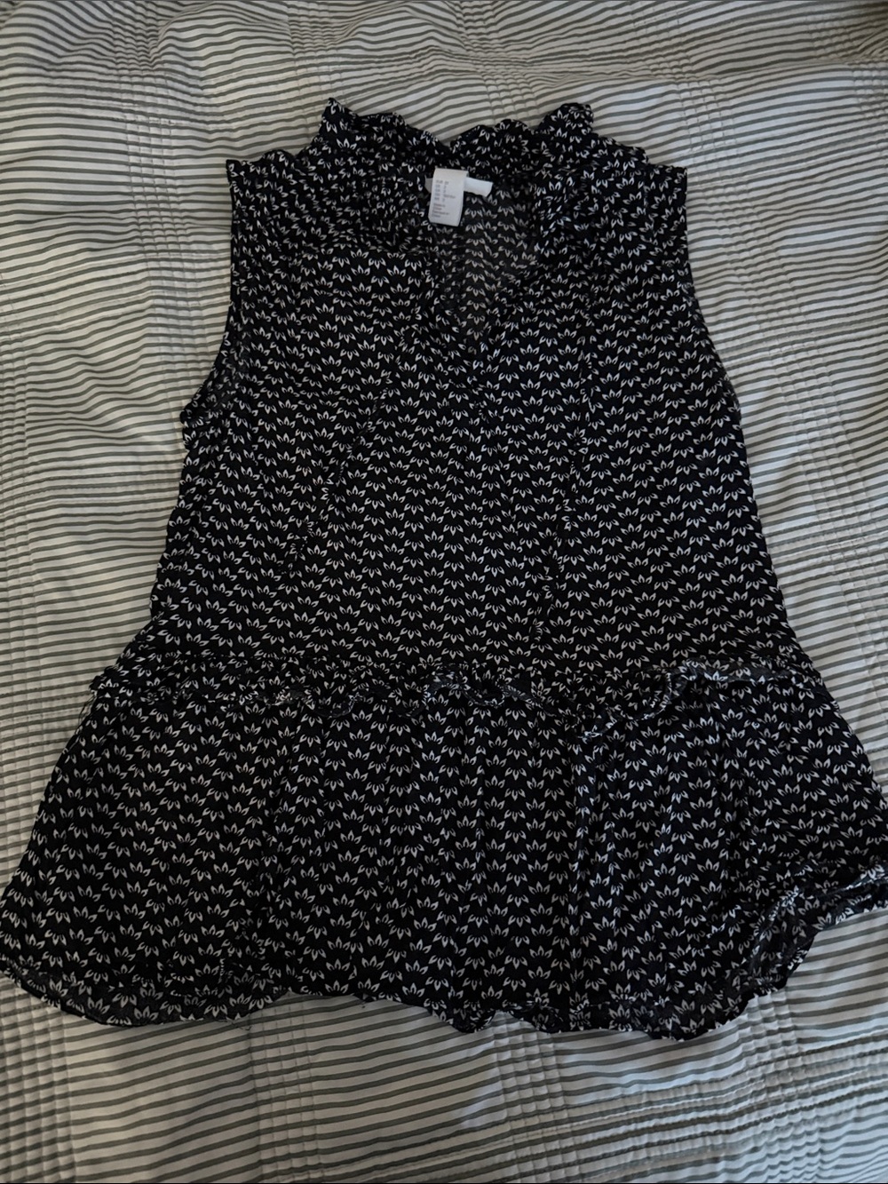 H&M Black Sleeveless Patterned Ruffle-Hem Blouse